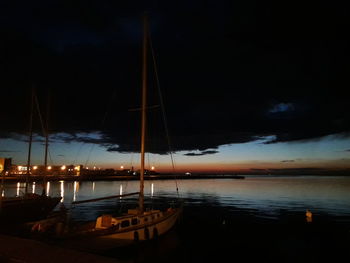 Scenic view of sea against sky at night