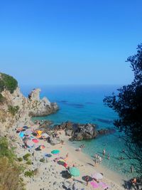 High angle view of beach against clear blue sky