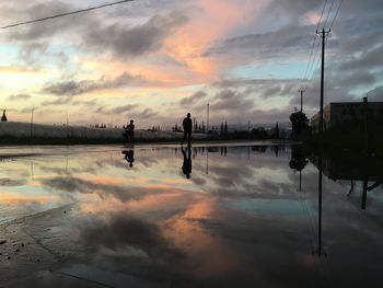 Reflection of sky on puddle