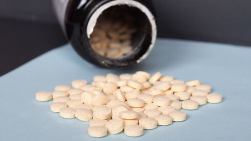 High angle view of pills on table