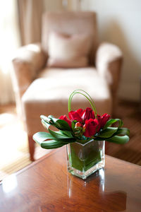 Close-up of vase on table at home