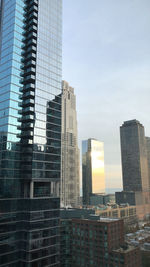 Low angle view of modern buildings against sky