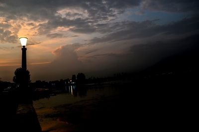 Silhouette of building at sunset