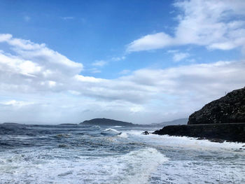 Scenic view of beach against sky