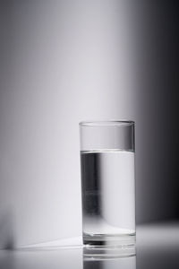 Close-up of glass of water on table