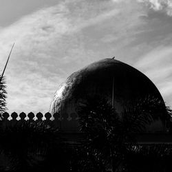 Low angle view of statue against sky