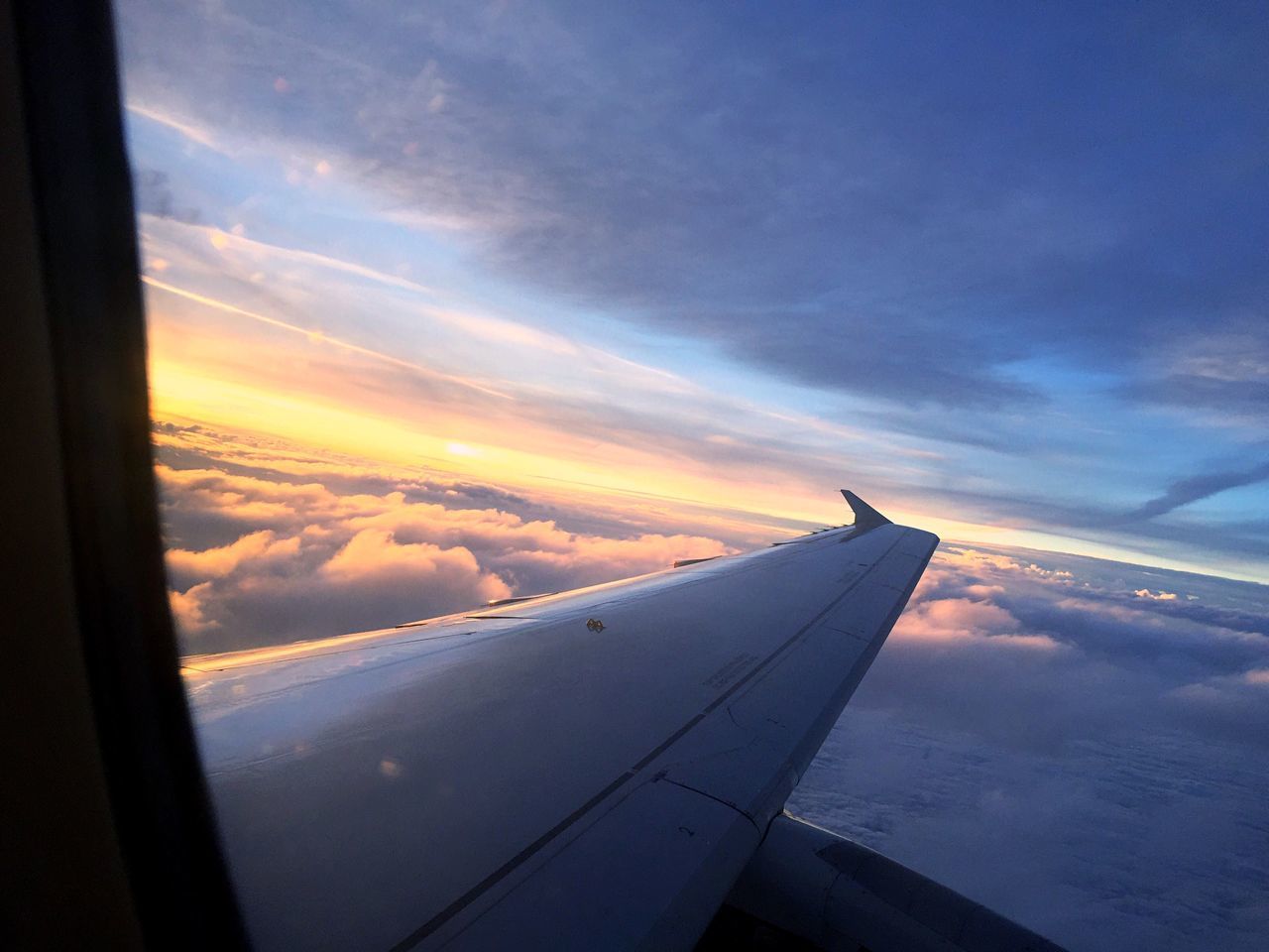 airplane, transportation, cloud - sky, sky, sunset, nature, beauty in nature, airplane wing, mode of transport, scenics, journey, tranquil scene, air vehicle, no people, travel, window, aircraft wing, aerial view, outdoors, flying, day, close-up