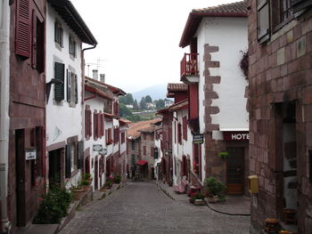 Narrow alley along buildings