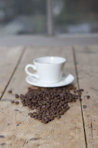 Close-up of coffee cup on table