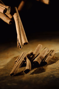 Close-up of man preparing food on table