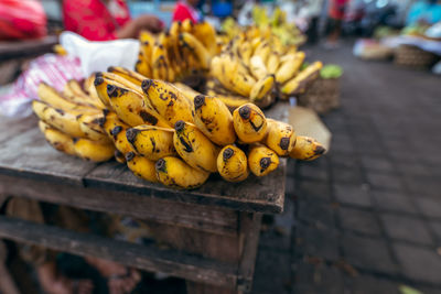 Close-up of yellow fruits for sale at street market