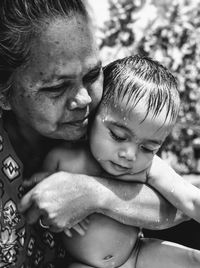 Close-up of mature woman with toddler boy