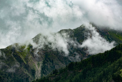 Mountain and cloud.