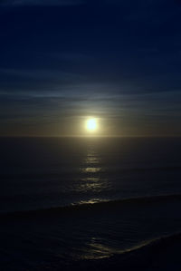 Scenic view of sea against sky at sunset