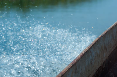 Close-up of water splashing in swimming pool