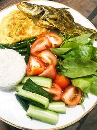 High angle view of chopped vegetables in plate