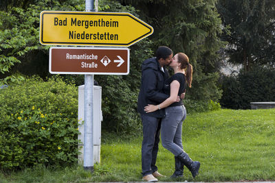 Full length of a man with yellow road