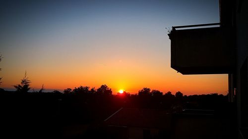 Silhouette of trees at sunset