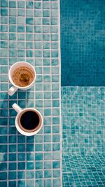 High angle view of coffee on pool