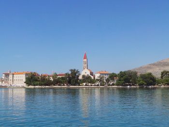 View of river with buildings in background