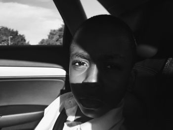 Portrait of boy in car