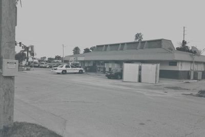 View of road along buildings