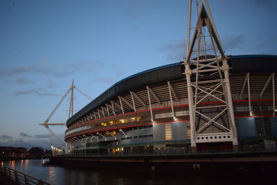 Low angle view of bridge over river against sky