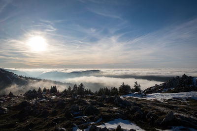 Scenic view of mountains against sky during winter