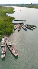 High angle view of boats moored on river