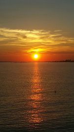 Scenic view of sunset over sea