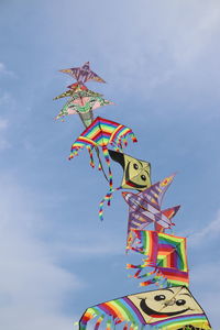 Low angle view of toys toy against sky