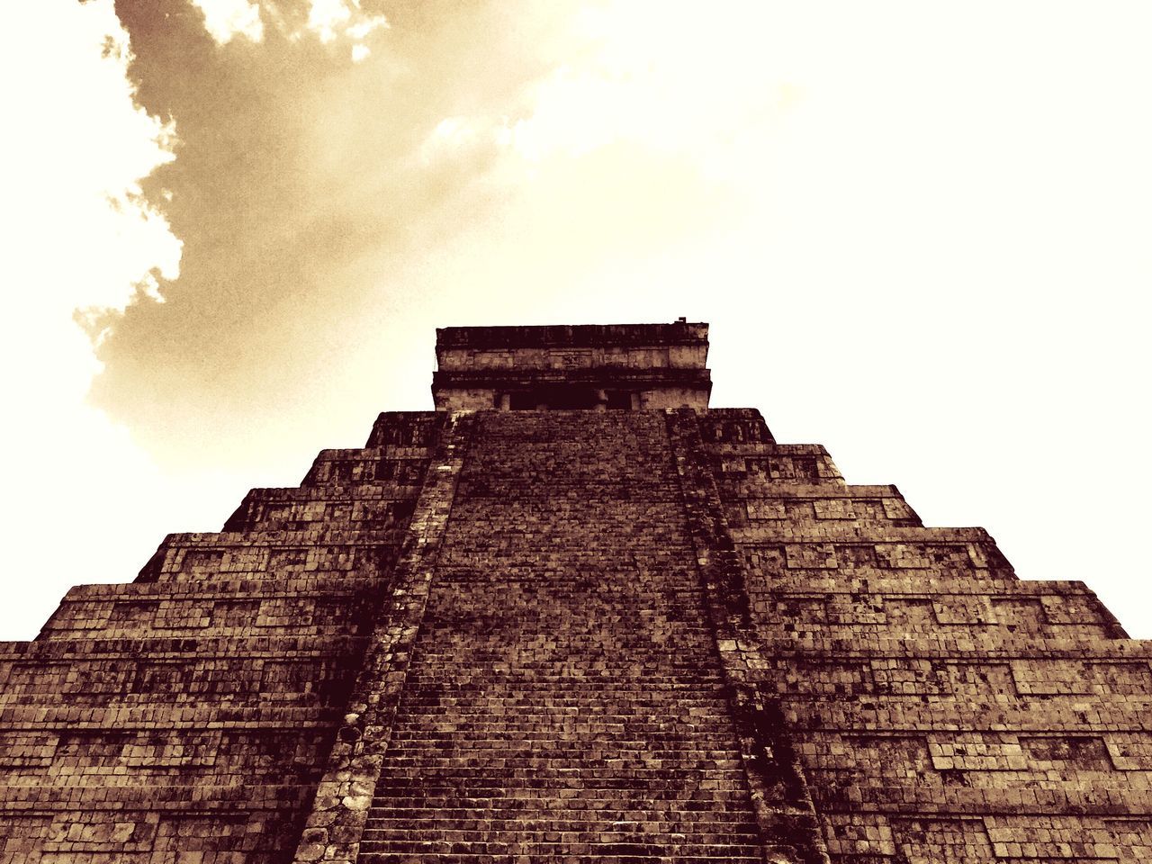 low angle view, architecture, built structure, history, sky, building exterior, ancient, clear sky, old, ancient civilization, the past, old ruin, famous place, stone wall, travel destinations, outdoors, day, travel, copy space, no people