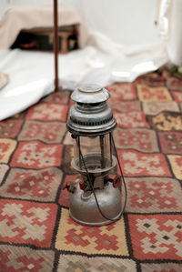 Close-up of lamp on table