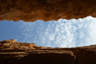 Low angle view of rock formations against sky. timna