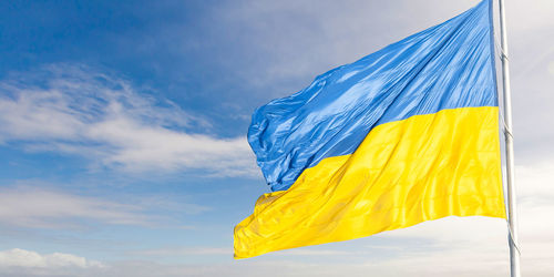 Ukrainian flag on blue sky backgroud