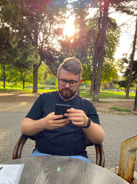 Young man using mobile phone