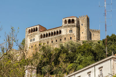 Low angle view of old ruin building against sky