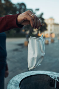 Close-up of hand holding ice cream