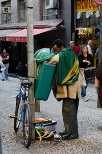 Man riding bicycle on street