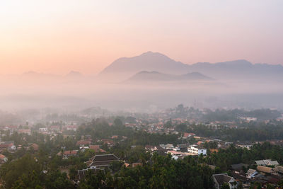 High angle view of townscape against sky during sunset