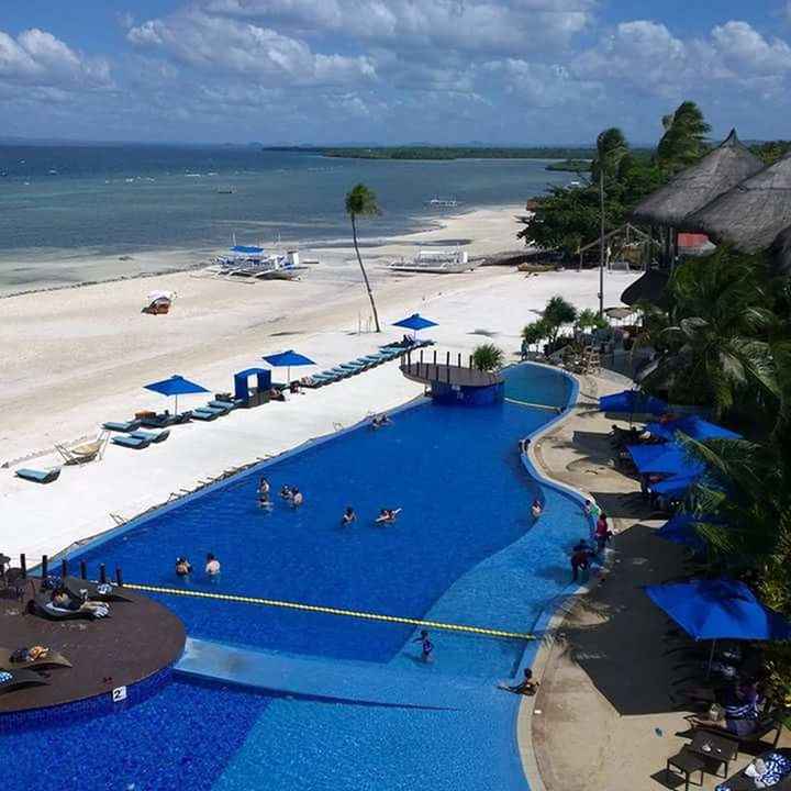 HIGH ANGLE VIEW OF SWIMMING POOL AT BEACH