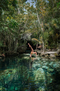 Yoga pose in cenote