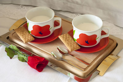 High angle view of coffee cups on table