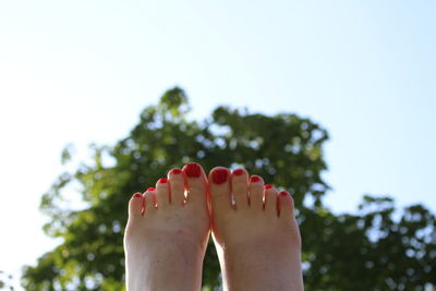 Low section of woman's feet