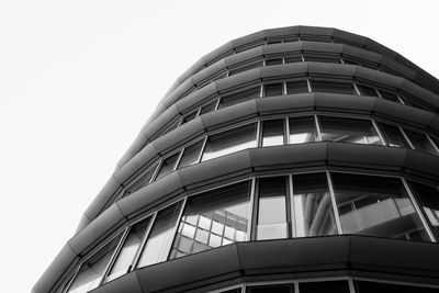 Low angle view of modern building against clear sky