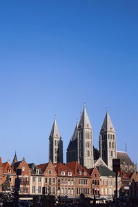 Cathédrale de tournai against clear blue sky