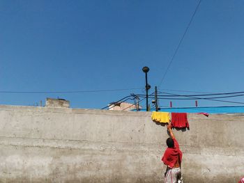 Rear view of a an drying clothes