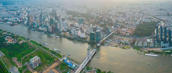 High angle view of river amidst buildings in city