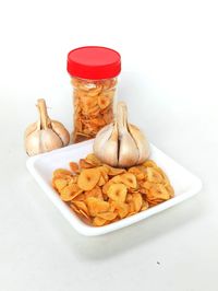 High angle view of cupcakes on table against white background