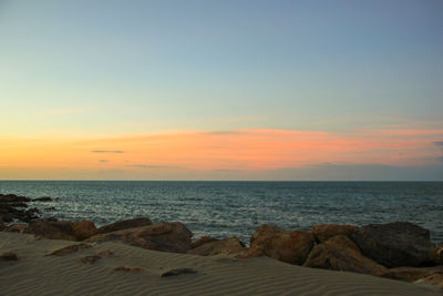 Scenic view of sea against sky during sunset